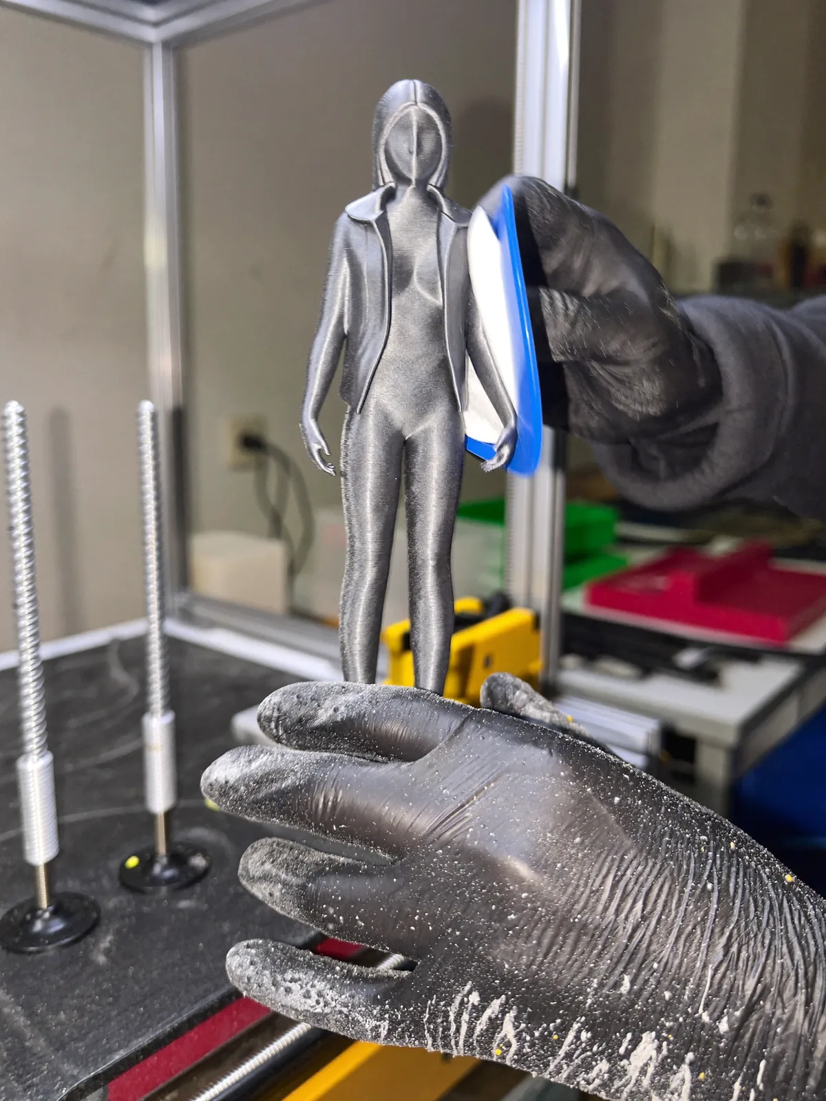 Freshly printed resin sculpture being cleaned in the workshop