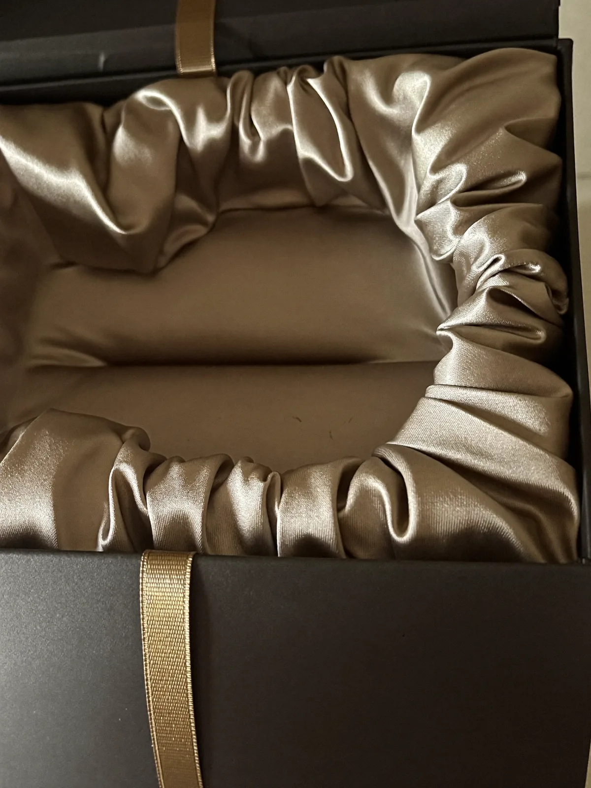 Satin lining detail inside the keepsake box