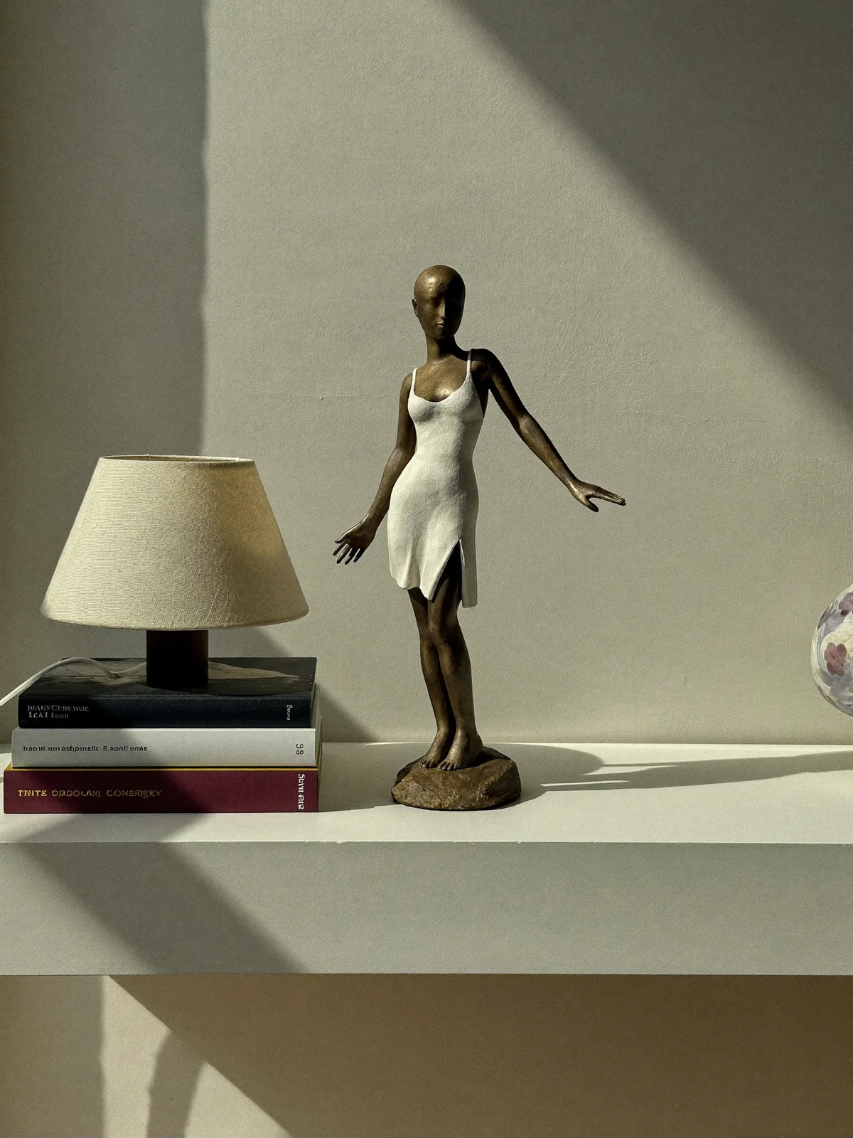Sculptural study piece displayed in a neutral interior